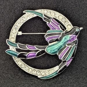 ANNE KLEIN. BIRD IN FLIGHT WITH CRYSTALS.